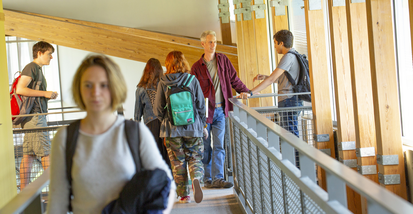 Students walking in Fisher Science and Academic Center