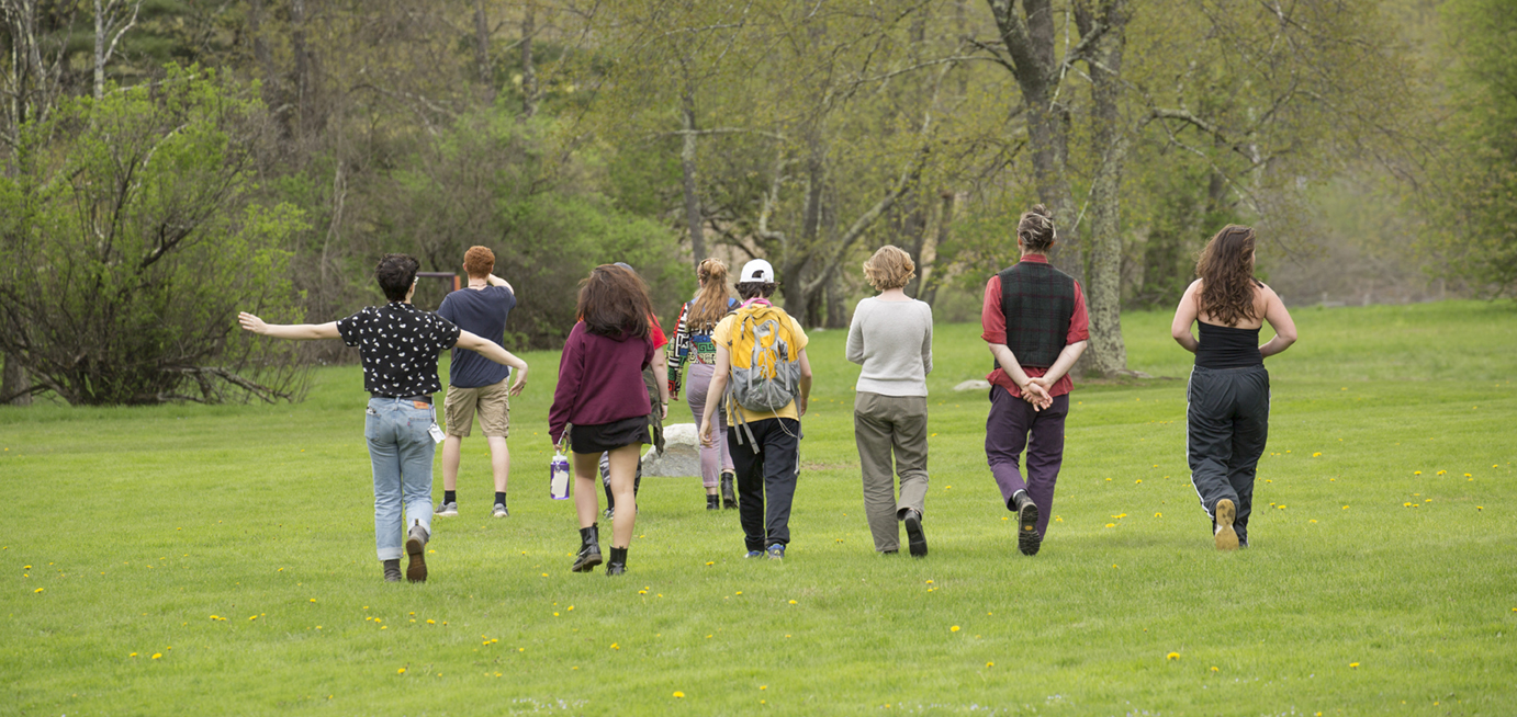 Students in art class walking in the spring time